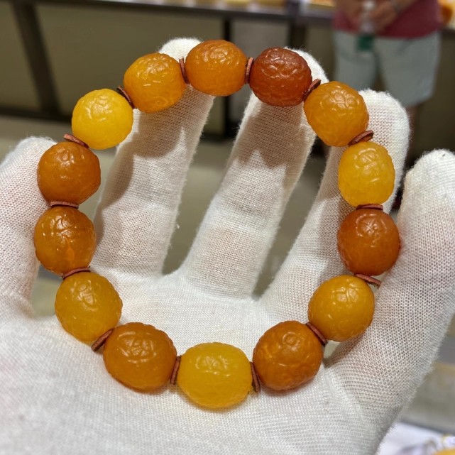 蜜蠟海漂籽料手串圖片_蜜蠟海漂籽料盤玩變化圖_海漂籽料和蜜蠟有什么區別